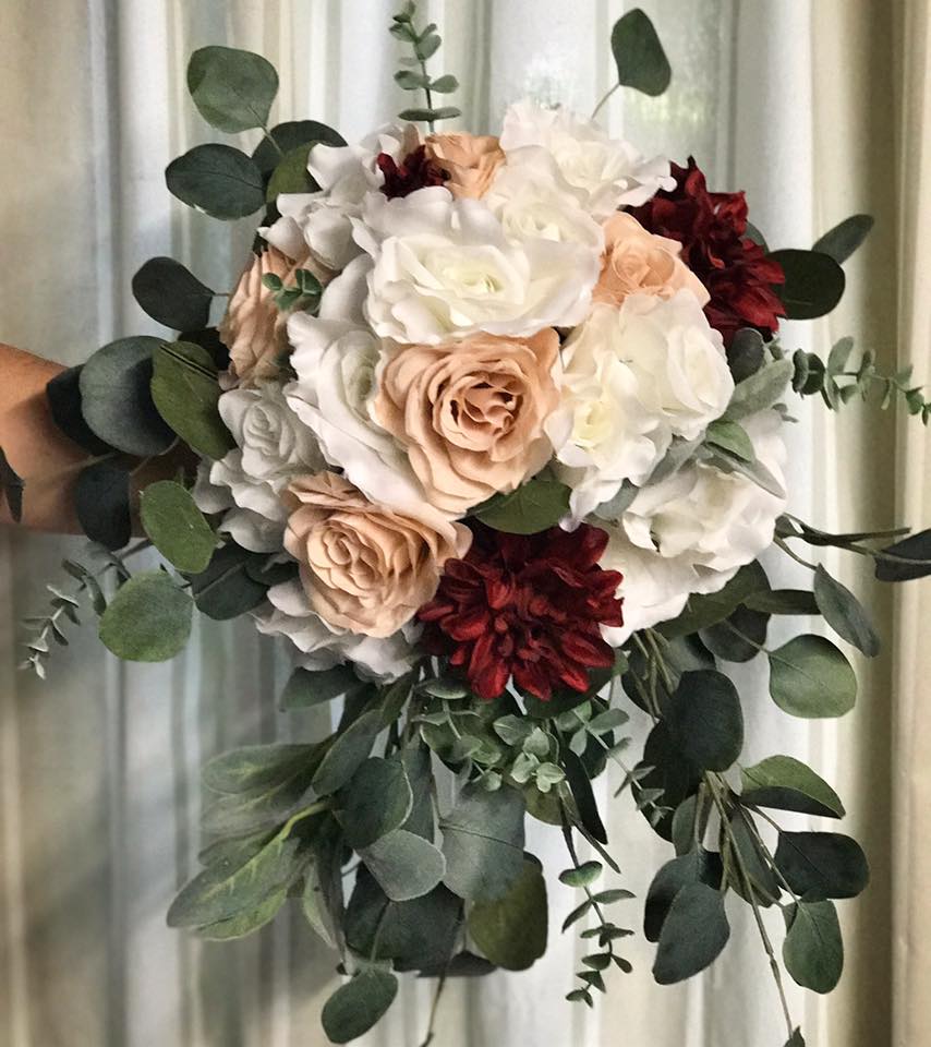 white, blush, and red bridal bouquet