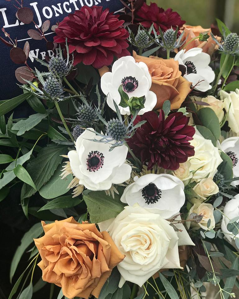 fall colored bouquet with anemones and roses