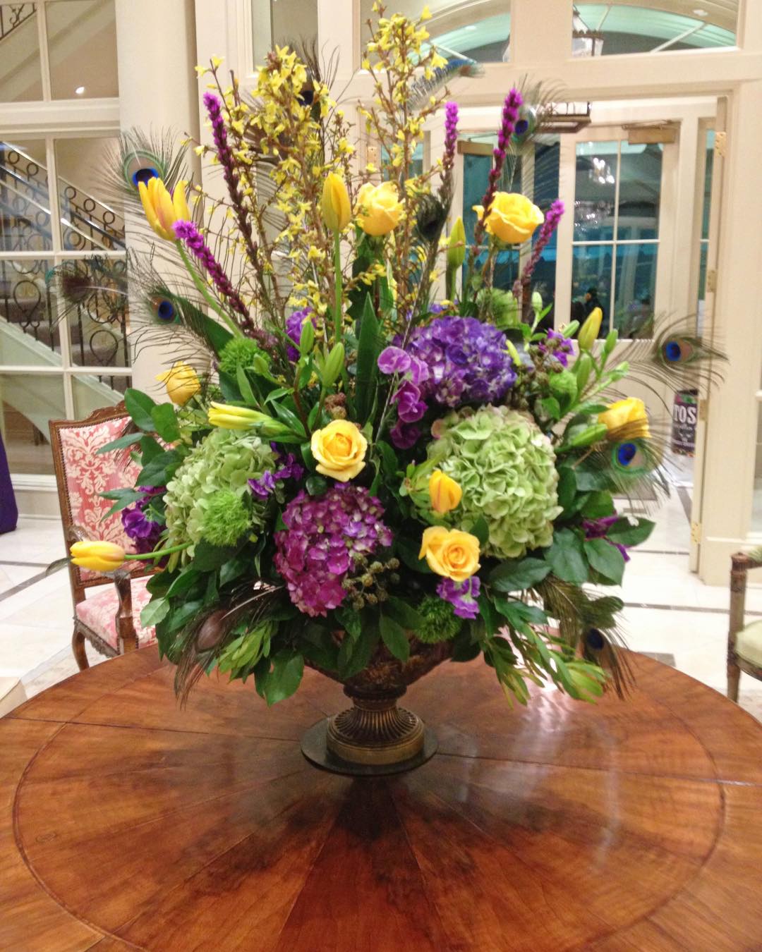 green, yellow, and purple large floral centerpiece